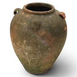 Large 20th century weathered terracotta urn, of ovoid form with four loop handles to shoulder, H61cm