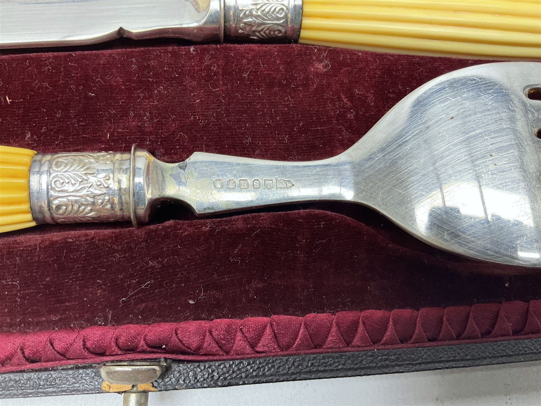 Walker & Hall silver-plate part canteen of cutlery, together with hallmarked silver cutlery comprising pair of Robert Pringle & Sons teaspoons, fork and butter knife, and silver handled knife and fork, cased set of Walker & Hall fish servers with simulated bone handles, and quantity of silver-plate and other cutlery