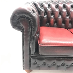  Three seat Chesterfield sofa, upholstered in deep buttoned oxblood leather, W194cm  