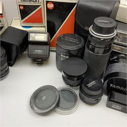 Minolta X700 camera body and Minolta XGM camera body, Tamron 'SP 60-300mm f3.8-5.4' lens, Tamron 'SP 35-80mm f2.8-3.8' lens', Tamron 'SP 500mm 1:8' CF tele macro catadioptric lens and various accessories including filters, tele-converter, flash etc