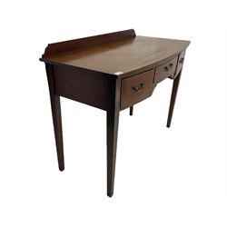 Edwardian mahogany dressing side table, raised back on bow front top with satinwood band, fitted with three drawers, inlaid with shell and fan motifs, square tapering supports