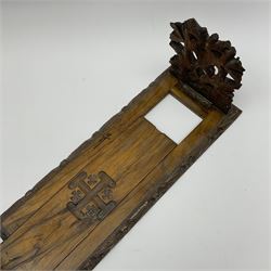 An olive wood book trough, the hinged ends carved as fruiting vines, with slide mechanism, not extended L36cm, extended L57.5cm