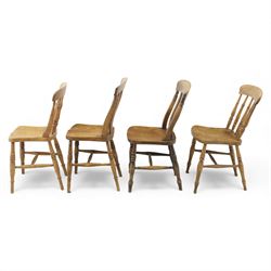 Eight Victorian farmhouse chairs in elm and beech, spindle-back frames with moulded seats, on turned and plain supports
