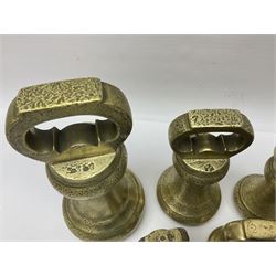 Set of seventeen Victorian brass bell weights