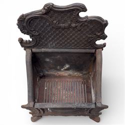 Cast iron fire grate with shaped front cab legs