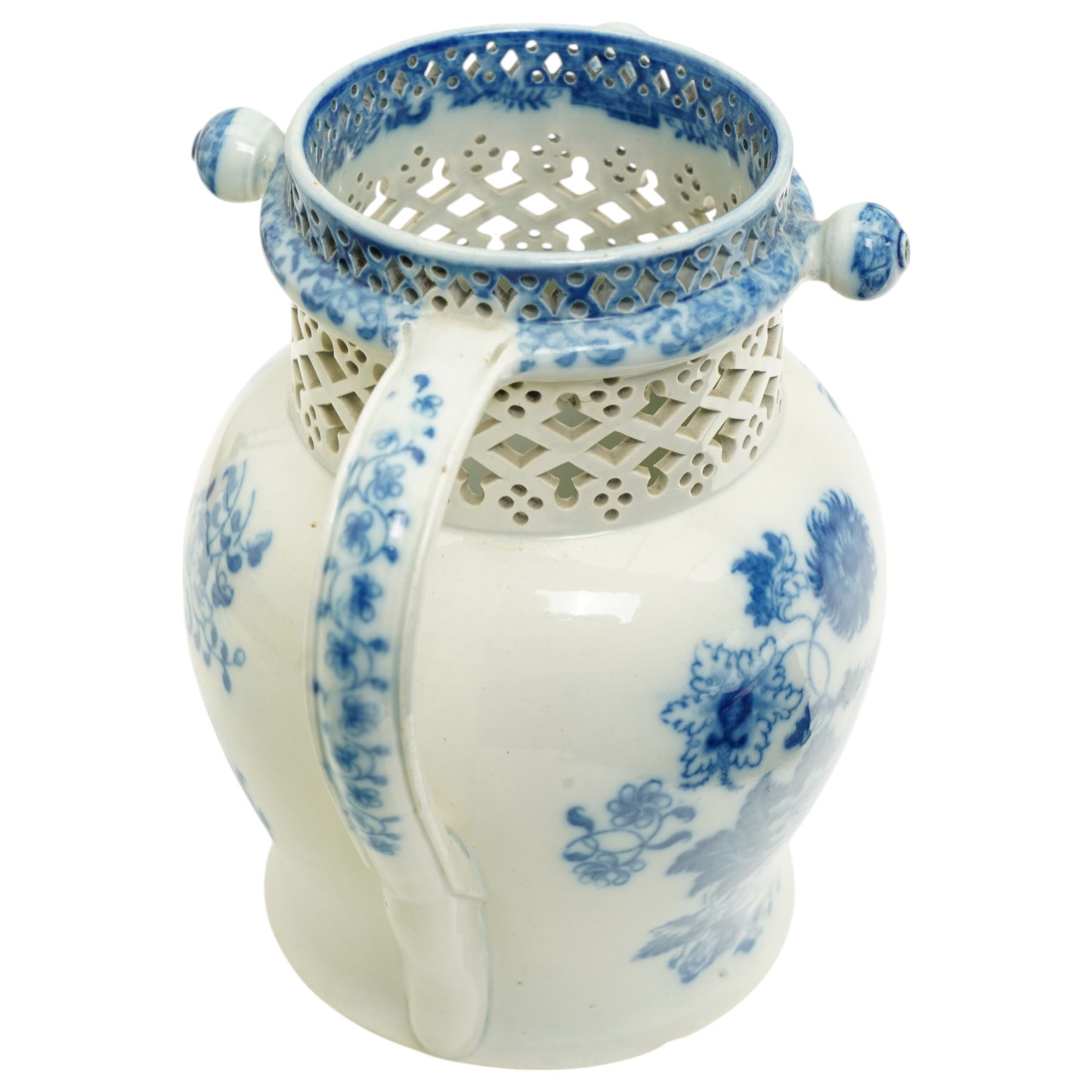 Swansea Cambrian pottery pearlware puzzle jug, c.1810, decorated in underglaze blue with peonies and sprigs of flowers, the straight-neck with three hollow spouts and openwork decoration, H18cm 