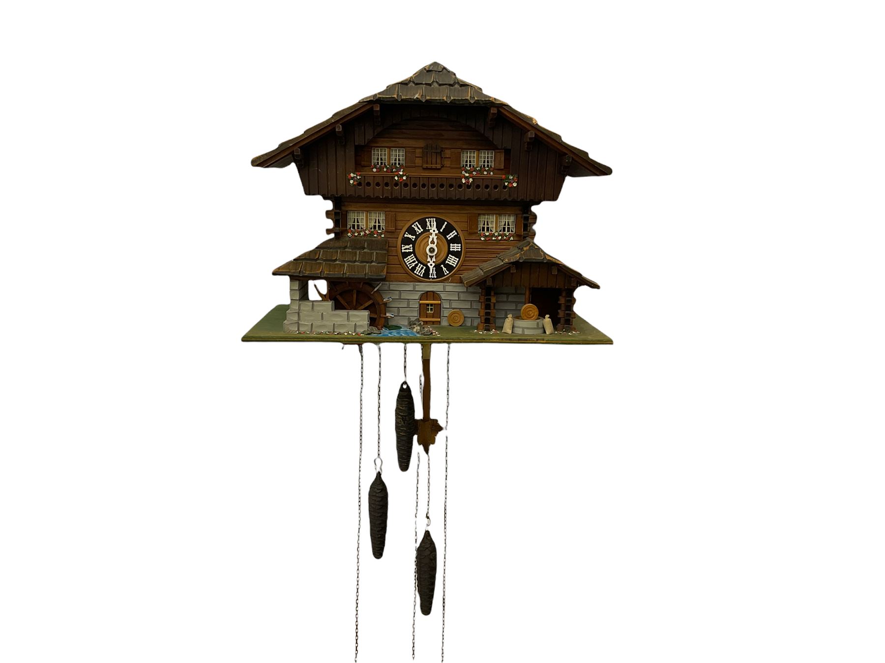 An automaton musical cuckoo clock with a 20th century three weight movement in the form of a Swiss Chalet with a working waterwheel, traditional dial and hands, thirty-hour movement with a cuckoo sounding the hours and half hours on twin bellows, hours followed by one of three tunes played on a musical box and the revolving of the water wheel. With pendulum and weights.




