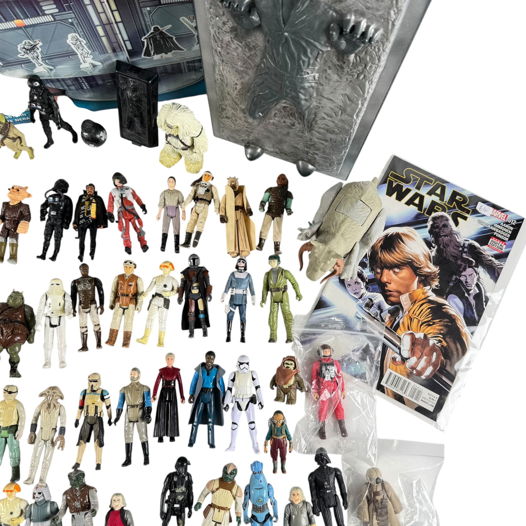 Collection of Hasbro Star Wars figures, including Han Solo prisoner action figure and loose 3.75 inch figures, Stor Disney Star Wars Death Star and a Modern Age Marvel Star Wars comic book issue #12