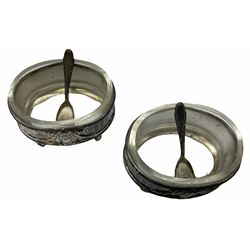 Two Georgian silver toddy ladles with baleen twist handles, (neither hallmarked), one with inset coin to bowl, together with a group of silver plate including cruet stand enclosing two glass bottles with stoppers, shaker and preserve pot with spoon, pair open salts with glass liners, etc. 