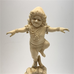 A large Japanese carved ivory okimono, modelled as a figure stood upon one leg with arms outstretched, upon a five headed serpent emerging from waves, H30cm.