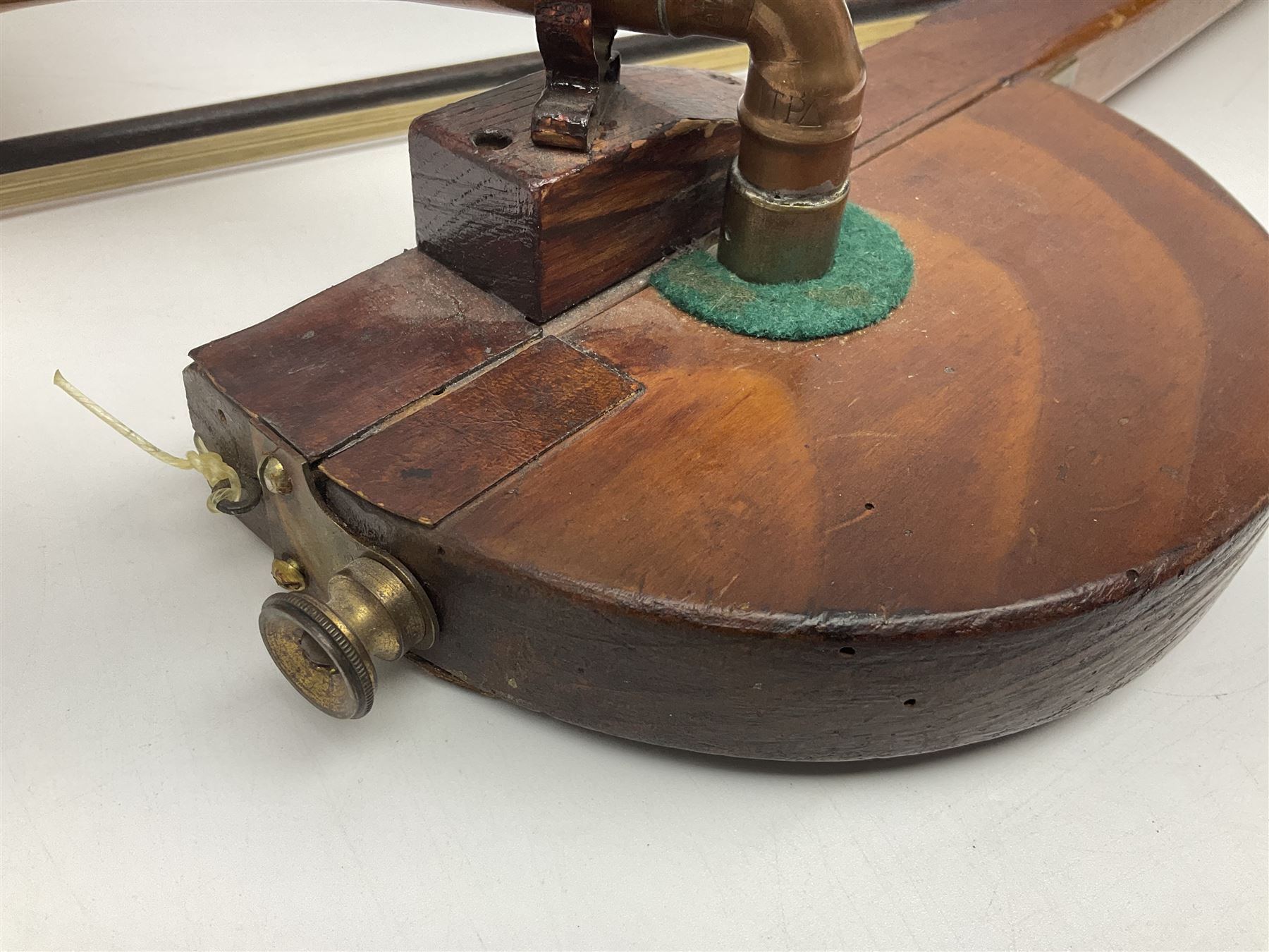 Fruitwood and elm single string phono fiddle with long neck and copper horn L76cm; and a violin bow (2)