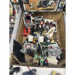 Large quantity of loose and boxed Lego of predominantly Batman and Star Wars interest, in four boxes