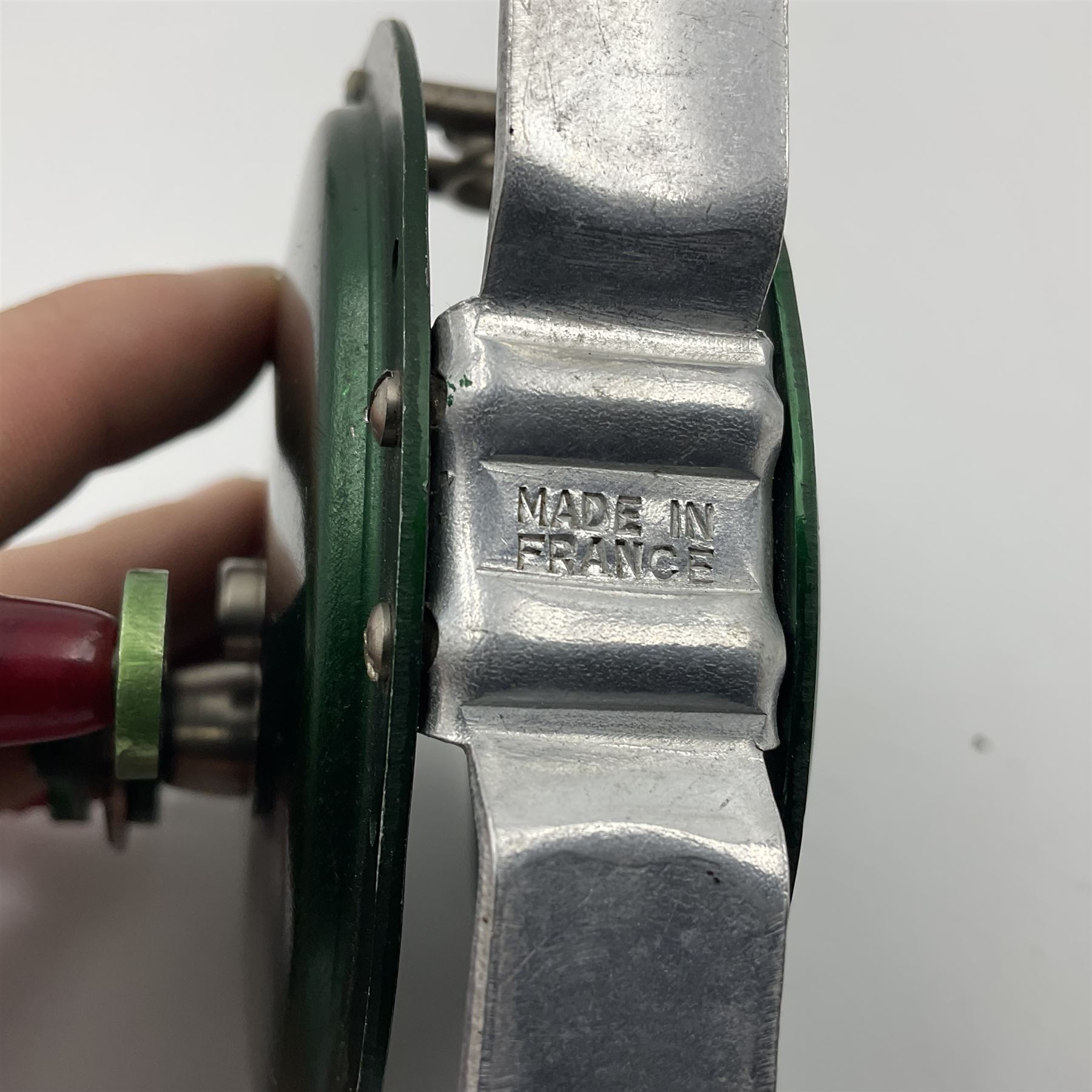 TO RTV Three fishing reels, including American Pflueger progress bulldog size 60 brass and chrome skeleton fly reel, with wooden handle; Maginot 106 fly reel and an alloy reel (3)