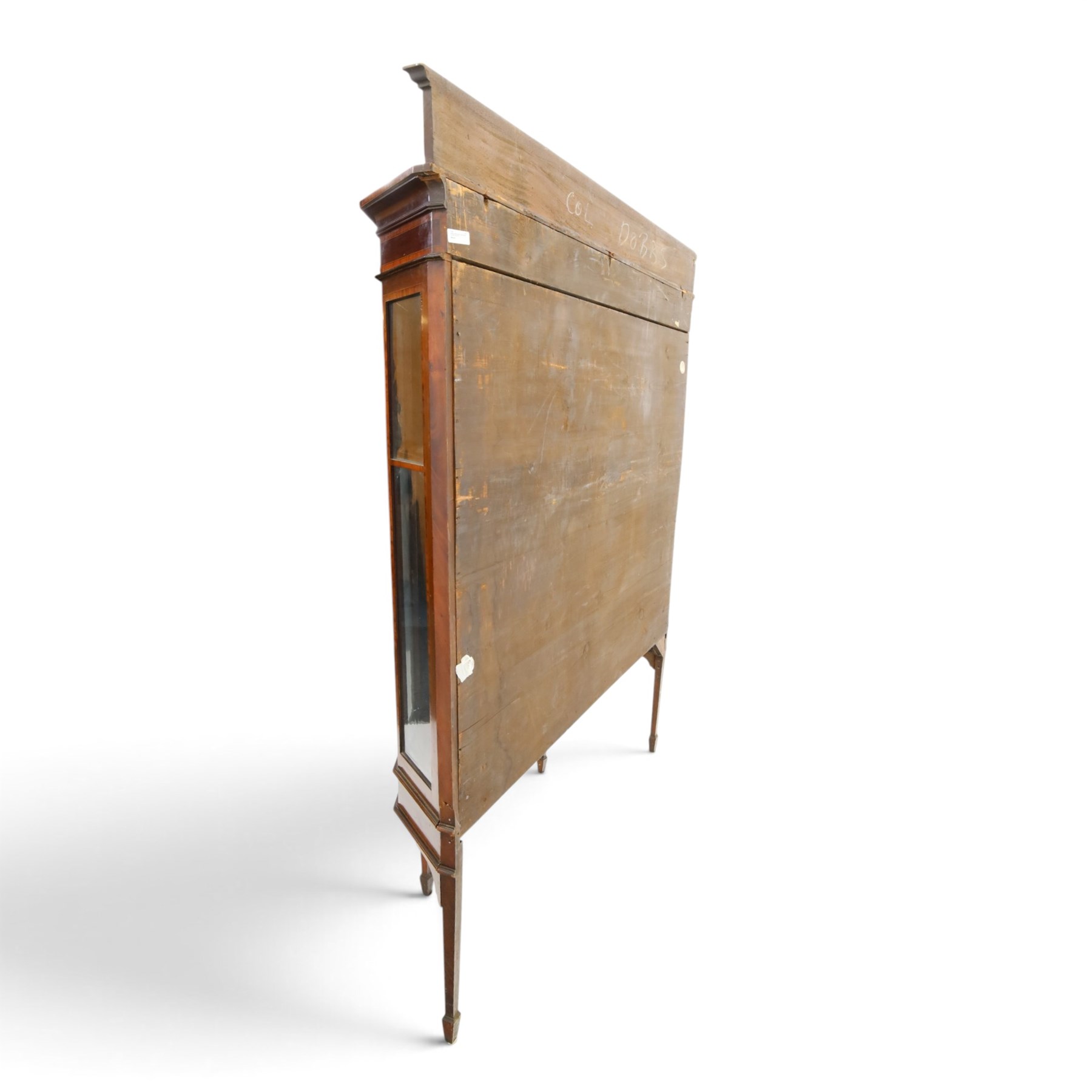 Edwardian inlaid mahogany display cabinet of rectangular canted form, galleried top with crossbanded inlay, above a glazed cabinet enclosing  baize lined shelves, raised on square tapering legs terminating in spade feet  