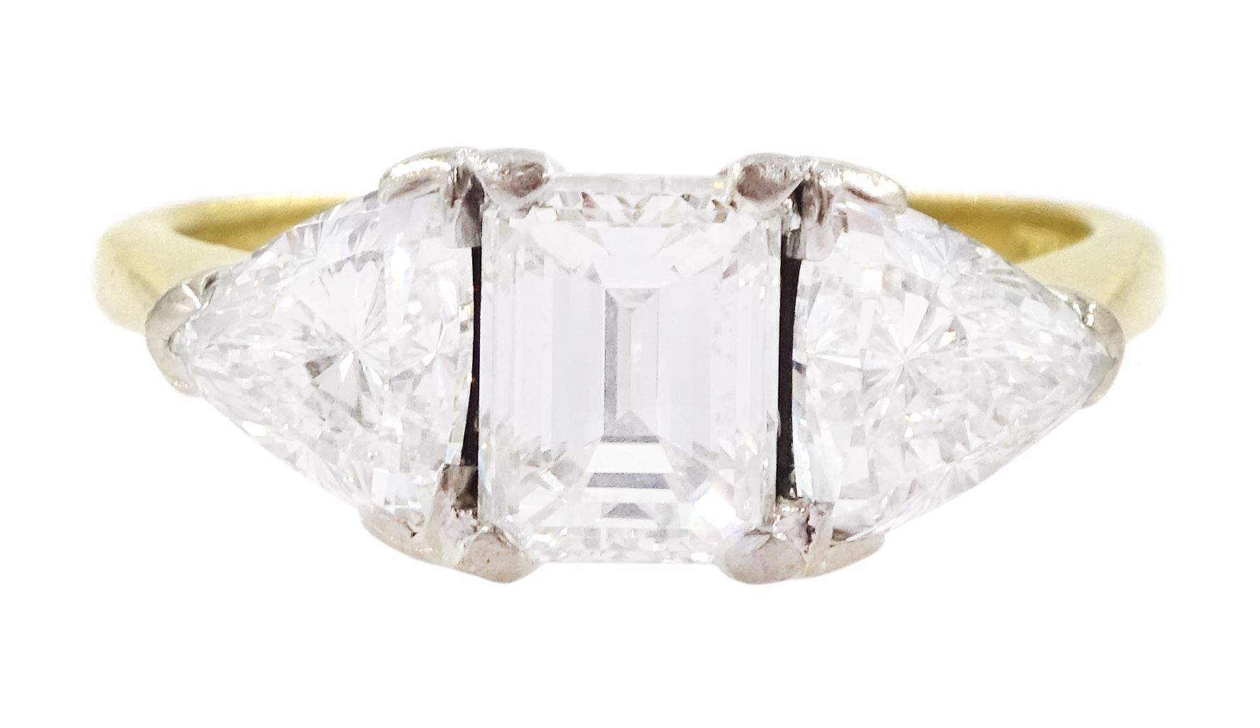 18ct gold three stone emerald cut and trillion cut diamond ring, Birmingham 1998, principal diamond approx 1.15 carat, each trillion cut diamond approx 0.80 carat, total diamond weight approx 2.75 carat