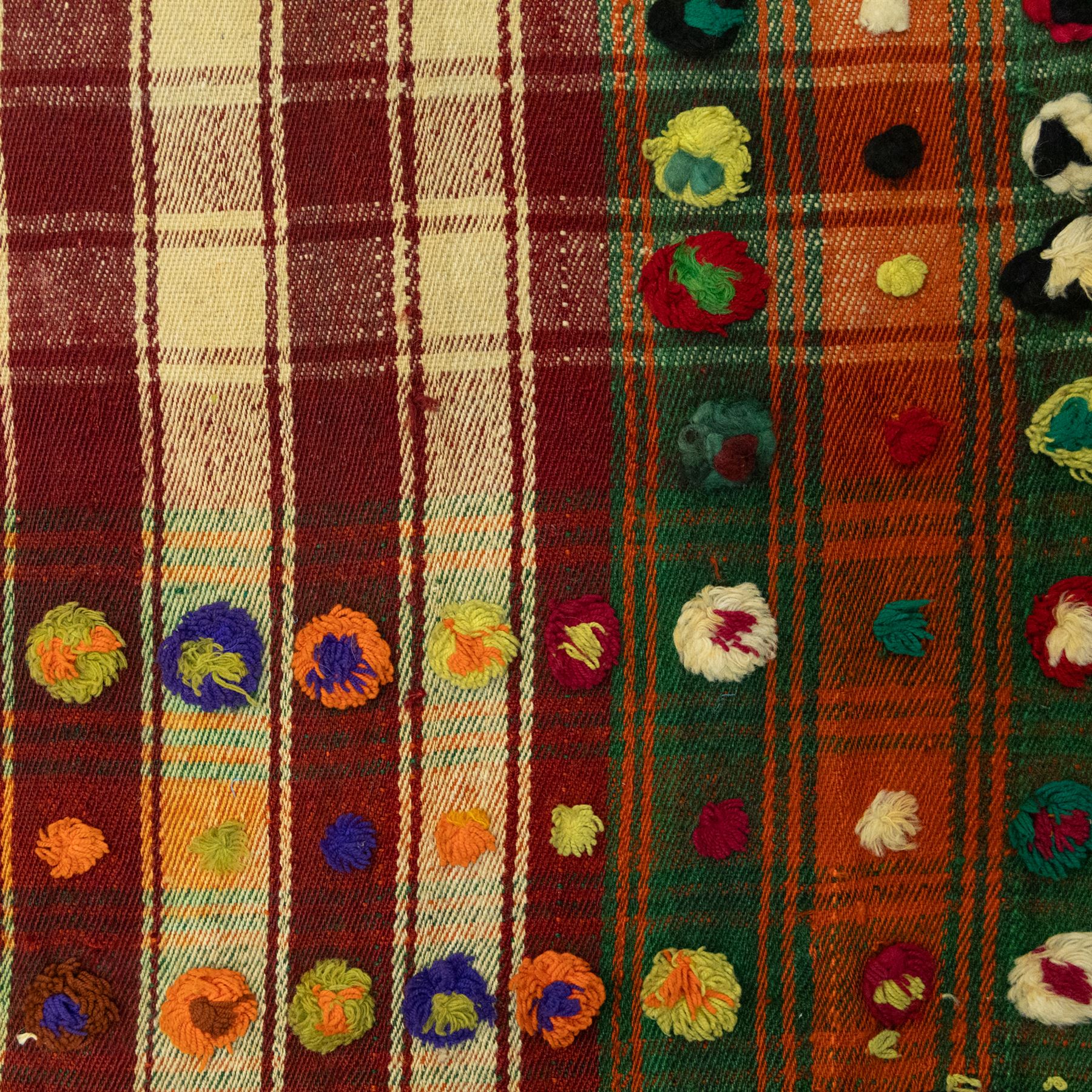 Southwest Persian Jajim kilim, flatwoven wool in a checked pattern of cream and red stripes, bordered with embroidered discs and colourful dot motifs