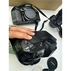 Six Minolta Dynax SLR camera bodies, comprising 800si serial no. 62703606, three 7xi examples, including one boxed example, serial nos. 20106944, 16123311 & 22107553, and two 9xi examples, serial no. 18209901 & 18202113, with three Minolta lenses, including Zoom xi 28-105mm 1:3.5(22)-4.5 lens, AF Zoom 28-85mm 1:3.5 (22)-4.5 lens and an AF Zoom 75-300mm 1:4.5(32)-5.6 lens, Hama carry case and other accessories