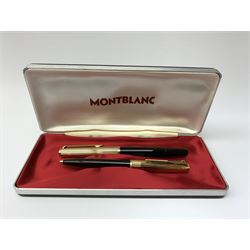 A Montblanc 227 fountain pen and 287 ballpoint pen set, circa 1970, each with black resin body, reeded gold plated cap, and white star emblem detail, the fountain pen with piston filling mechanism and nib marked 585, the ballpoint with lever action, in maker's case. 