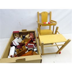  Two wooden dolls houses, H71cm max, some dolls house furniture and a metamorphic high chair   