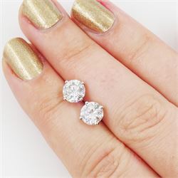 Pair of 18ct white gold round brilliant cut diamond stud earrings, stamped, total diamond weight 2.01 carat, with World Gemological Institute report