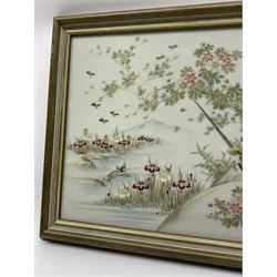 Framed Japanese porcelain plaque, painted with exotic birds, flowers and a blossoming tree, with impressed character mark verso, overall H32cm L38.5cm