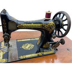 Singer - walnut and cast iron treadle sewing machine