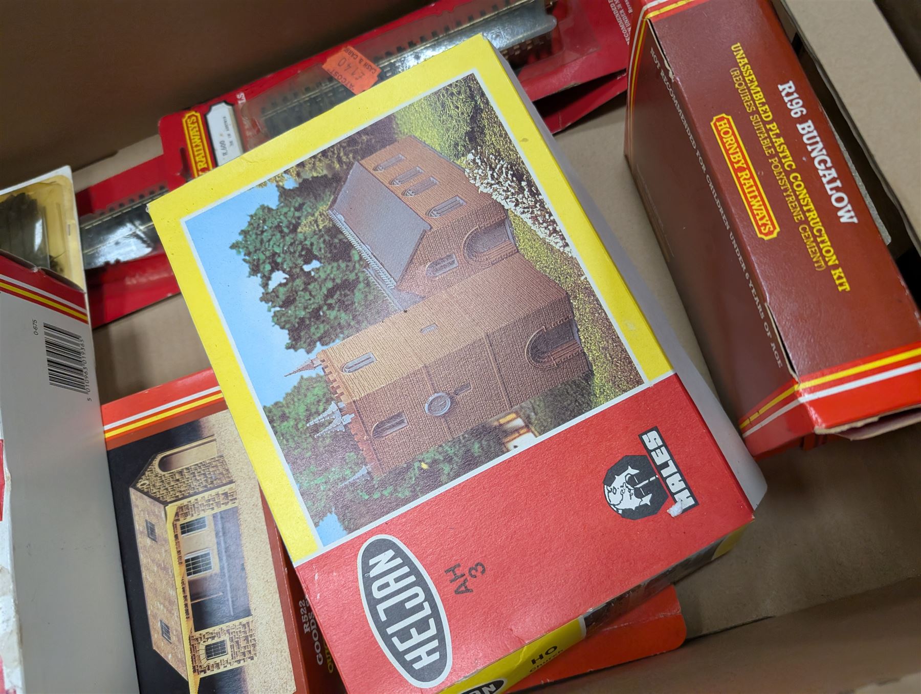 Collection of mostly Hornby '00' gauge model railway, including two Inter-City locomotives and carriages, railway buildings and scenery, track, controllers and other accessories, some boxed and some empty boxes