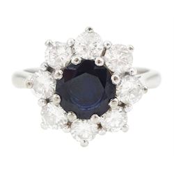 White gold round cut sapphire and round brilliant cut diamond cluster ring, stamped 18ct, ...