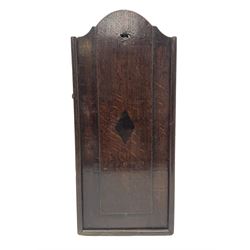 Georgian oak wall mounted candle box, of rectangular form with sliding cover inlaid with a lozenge, L40cm