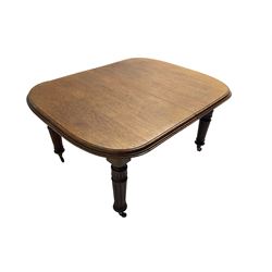 19th century mahogany extending dining table, telescopic action, rounded rectangular moulded top, on turned and fluted supports with brass and ceramic castors