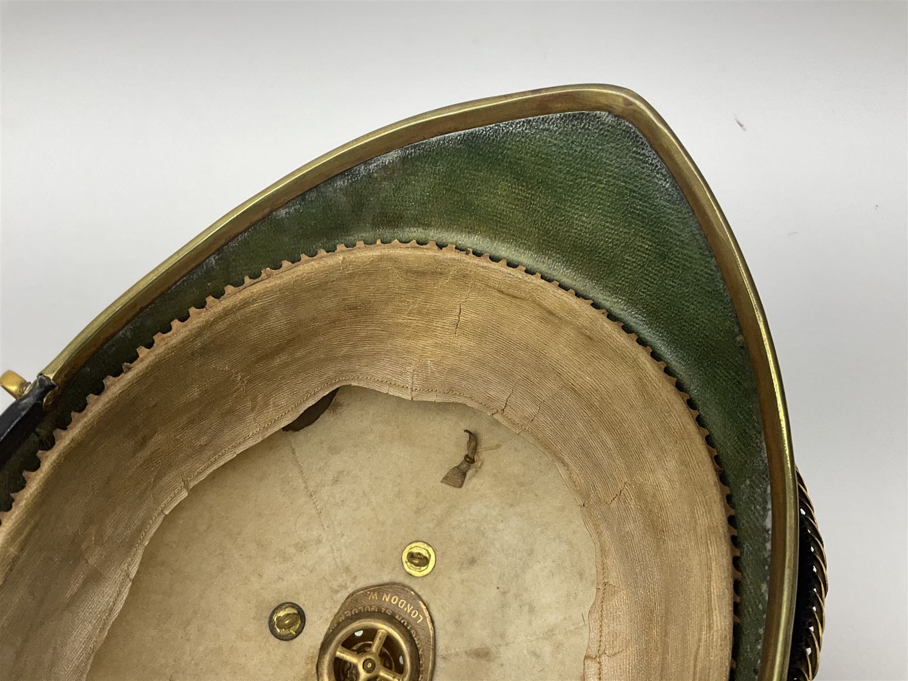 Post-1902 Welsh Regiment Officer's Home Service Blue Cloth Helmet with gilt metal King's crown helmet plate to the front, a removable spike to the top on a shaped cruciform base with rosette fittings, rosette side bosses, brass trim to the front peak, and leather and velvet backed chin scales, with sweat band, the interior with the remains of a makers label at the address 1,3 & 5 Lexington Street, Golden ? London W (presumably Hobson & Sons)