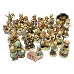 Twenty two Hummel figures by Goebel, to include Stormy Weather, Forty Winks, Little Thrifty, Sparkling Shell etc 
