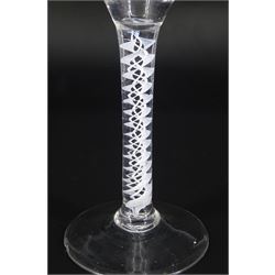18th century drinking glass of possible Jacobite interest, the ogee bowl engraved with carnation and bee, upon a double series opaque twist stem and conical foot, H16cm