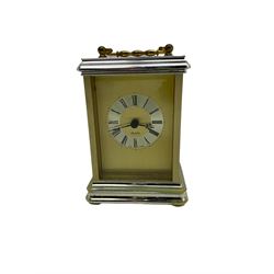Three quartz mantle clocks and one 1930s mantle clock