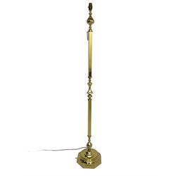 Traditional brass standard lamp, square and turned column on a stepped base, with shade