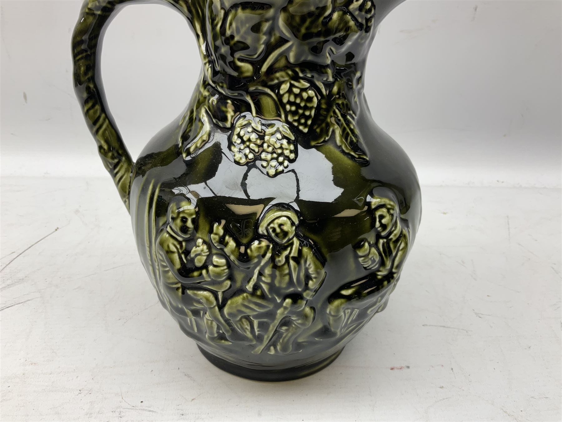 Three jardinières comprising West German Gerz example decorated in relief, Doulton Slaters example with frilled everted rim and a majolica example, and a further two Arthur Wood majolica jugs (5)