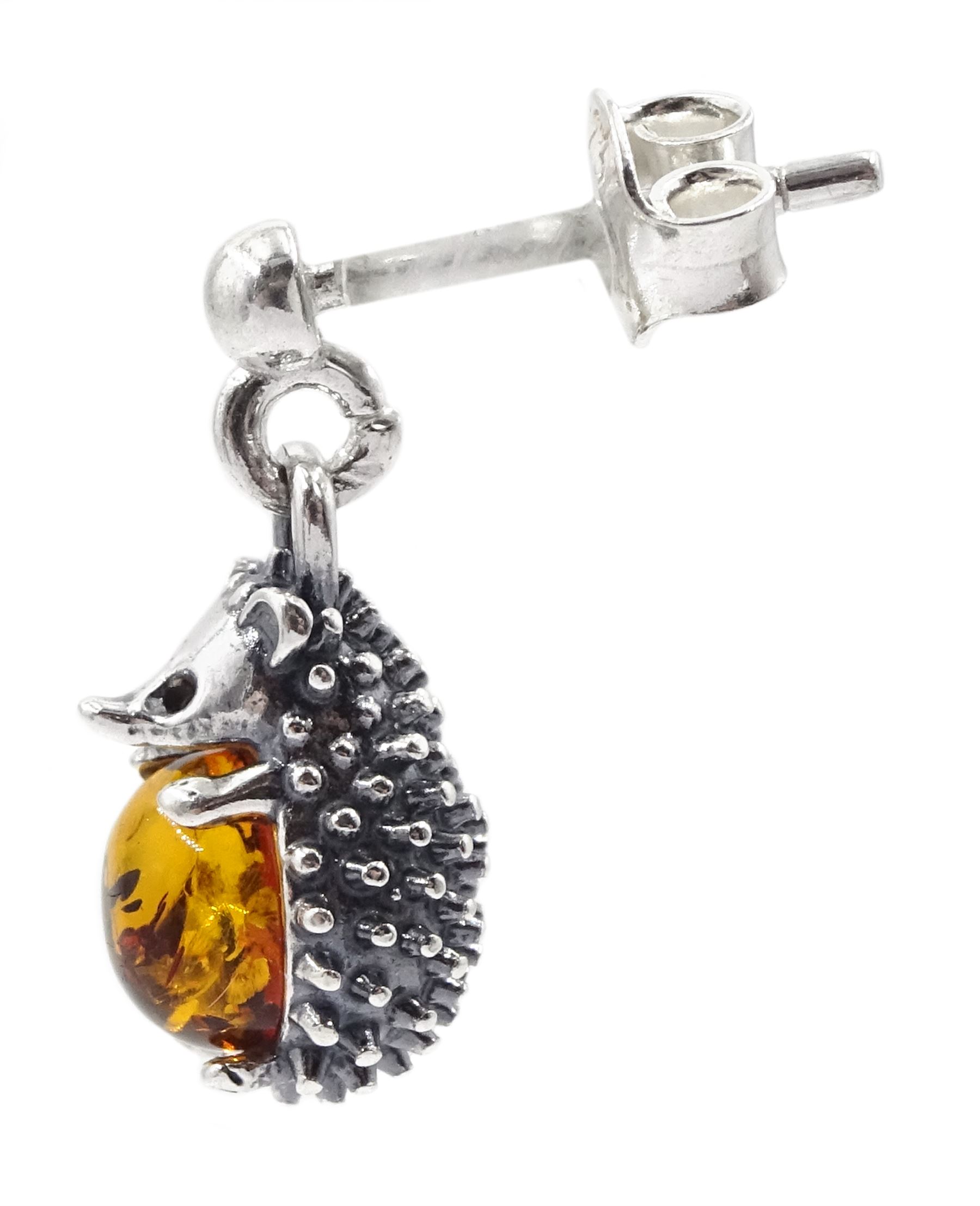 Pair of silver amber hedgehog pendant stud earrings