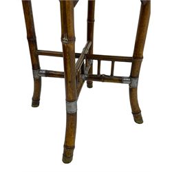 W.F. Needham - Victorian bamboo occasional table, octagonal lacquered top, the bamboo joined by metal brackets, brass cups stamped 'W.F Needham'