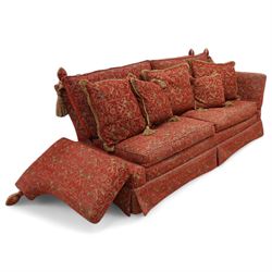 Large Knole design hardwood-framed three-seat drop-arm sofa, upholstered in crimson fabric decorated with trailing acanthus leaves and shields, together with scatter cushions 