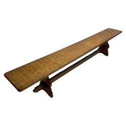 Gnomeman - adzed oak narrow bench, rectangular seat on shaped end supports united by pegged stretcher, carved with gnome signature, by Thomas Whittaker, Little Beck 