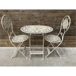 Cast metal bistro set including ornate oval garden table and two matching chairs