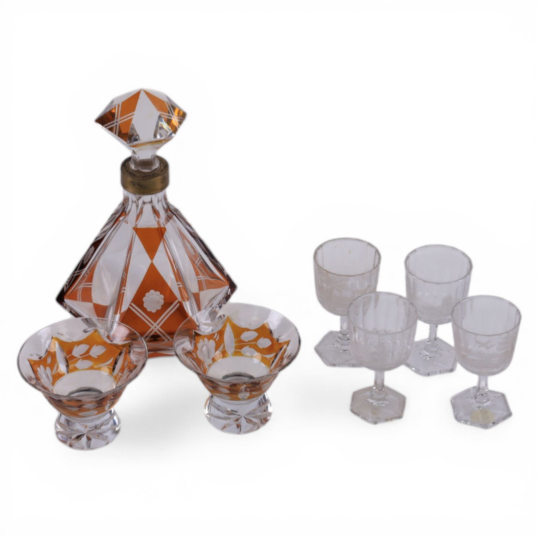 Set of four Galle, Nancy, intaglio engraved liqueur glasses, Gallé, Nancy, circa 1880, each with faceted bucket bowl engraved with animals within landscape settings, two examples engraved 'Galle Reinemer a Nancy', one engraved 'Galle a Nancy', and one unsigned, H7cm, together with a small Bohemian Art Deco amber overlaid glass decanter with stopper and two glasses, decanter H17cm