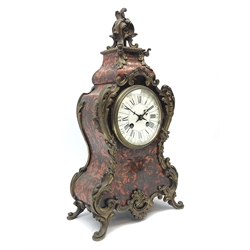 Early 20th century red tortoiseshell, Boule and ormolu mounted mantel clock white enamel convex Roman dial with Arabic five minute divisions, twin train movement stamped Made in France A&N 63536 striking the hours on coil, H41cm  