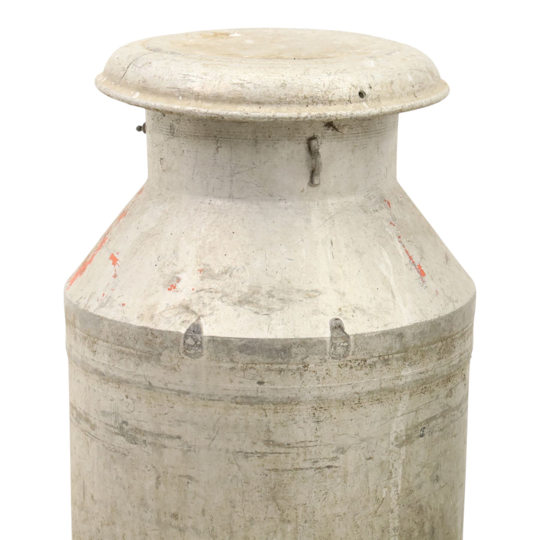 20th century aluminium set of three milk churns, with handles, baring the stamps of 'Middlesborough Co-op', 'Holme Moor', 'Wholesale Dairies' 