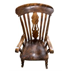 Late 19th century elm and beech farmhouse rocking chair, pierced splat and lath high back over saddle seat with turned supports