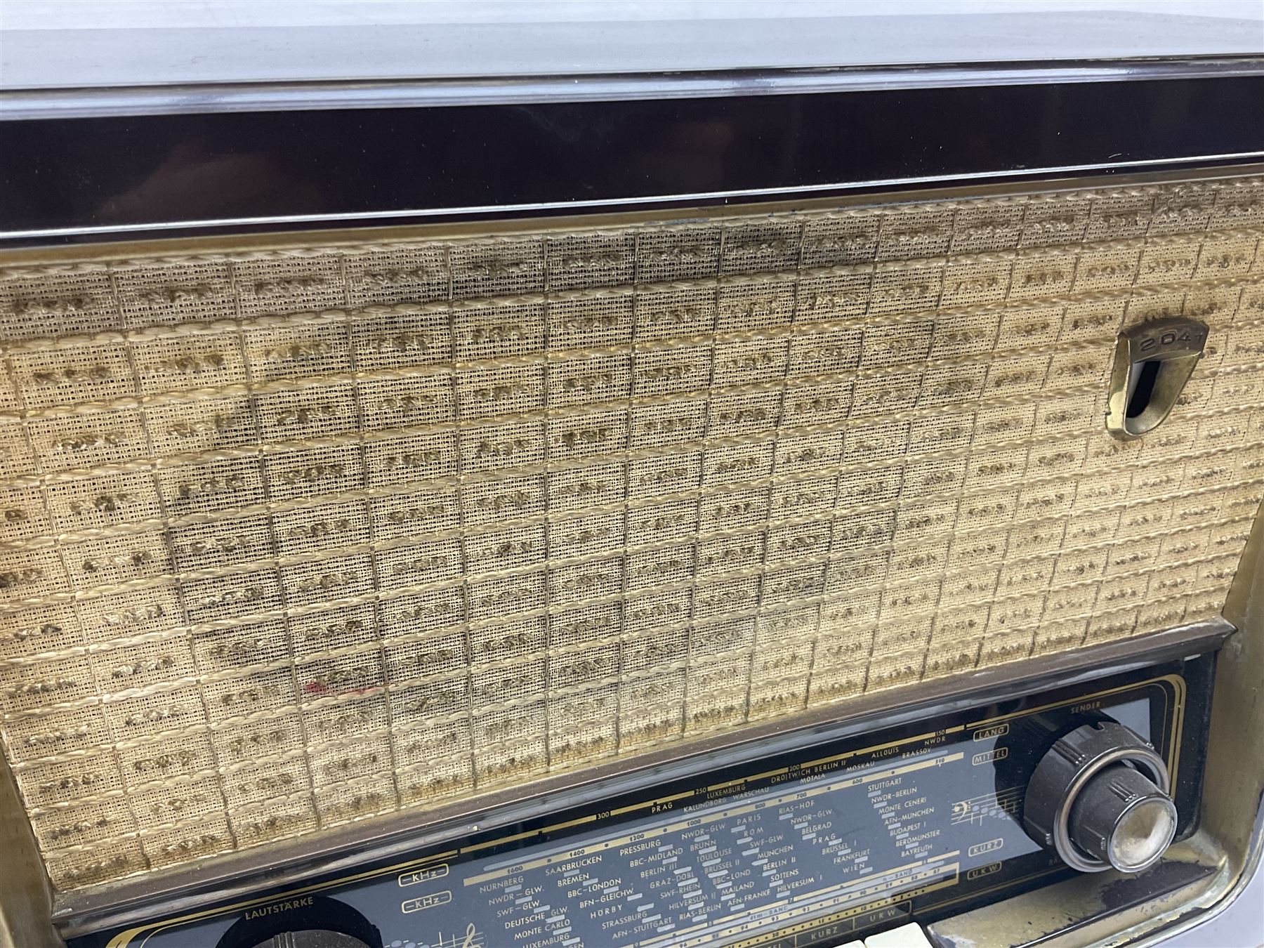 1950s Philips valve radio model B3G63A in brown Bakelite case, W42cm D21cm H30cm, together with 1950s Cossor Melody Maker model 524 radio and 1950s Grundig model 2041, tallest H35.5cm