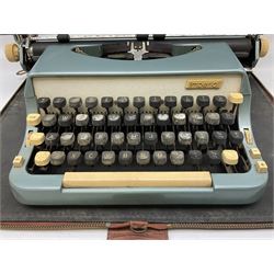 Imperial typewriter in brown leather carrying case, together with fall front coal box, brass carrying handles, together with a brass figural table lamp modelled as man with a walking stick and lampshade 