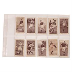 Forty Churchman's and Ogden's football cigarette cards, including twenty-two Association Footballers' and seven 'Football Club Colours' examples