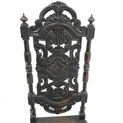 19th century heavily carved oak hall chair, solid seat, baluster supports joined by stretchers, W51cm
