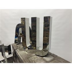Ten industrial style metal letters, together with a military metal 'Drill' tin, letters H27cm